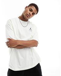 Nike - Flight essentials - t-shirt à logo - Lyst