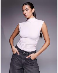 GOOD AMERICAN - Weightless Sculpting Sleeveless High Neck Bodysuit - Lyst