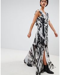 religion prosperity ruffle maxi dress
