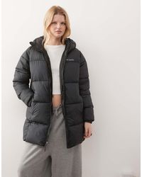 Columbia - Chaqueta Acolchada Midi Negra Con Capucha Puffect Ii De - Lyst