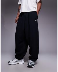 Nike - Club French Terry Oversized Joggers - Lyst