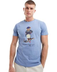 Polo Ralph Lauren - T-shirt azzurra con stampa di orsetto sugli sci - Lyst