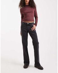 Monki - Wakumi Low Waisted Boot Cut Jeans - Lyst