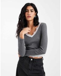 ASOS - Geribbelde Top Met Lange Mouwen En Kanten Detail - Lyst