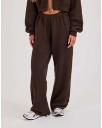 CERNUCCI - Knitted Logo Wide Leg Jogger - Lyst