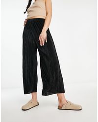 ASOS - Pantaloni culotte plissé neri con fondo ampio - Lyst