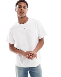 Levi's - Camiseta blanca holgada con logo en relieve - Lyst
