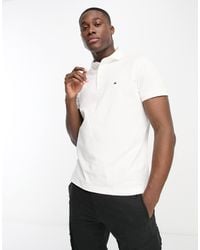 Tommy Hilfiger - 1985 - polo ajusté en piqué avec logo emblématique - Lyst
