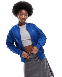 Nike - Giacca bomber double-face stile college colore - Lyst