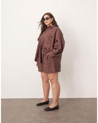 ARRANGE - Curve Cotton Mirrored Floral Embroidered Cutwork Shorts - Lyst