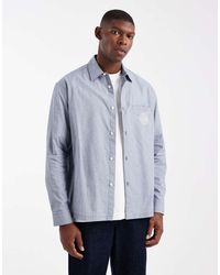 ASOS - Camicia Comoda Blu A Quadri Con Ricamo Sul Petto - Lyst