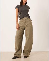 ASOS - Jean coupe ample à taille haute - kaki délavé - Lyst