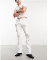 ASOS - Flared Jeans With Distressed Rips - Lyst