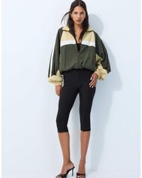 Stradivarius - Coupe regular veste coupe-vent color block kaki - Lyst