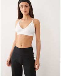 4505 - Icon Seamless Intimate Light Support Sports Bra With Adjustable Straps - Lyst