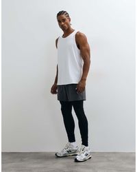 4505 - Icon Active Quick Dry Base Layer Training Tight With Phone Pocket - Lyst