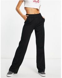 ONLY - Pantaloni con fondo ampio e vita elasticizzata neri - Lyst
