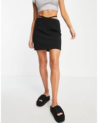 NA-KD - Minifalda negra con detalle - Lyst