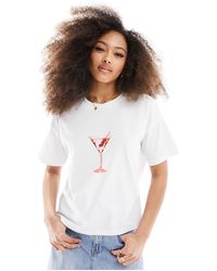 ASOS - T-shirt oversize à imprimé martini - ivoire - Lyst