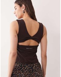 Sweaty Betty - All Day Twist Back Bra Tank - Lyst