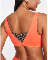 Nike - Sneakerkini - top bikini con scollo rotondo - Lyst