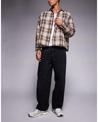 River Island - baggy Washed Jeans - Lyst