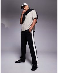 Faded Store - Wide Leg Contrast Side Stripe joggers - Lyst