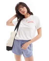 Pieces - Camiseta blanca extragrande con estampado "tokyo" rojo - Lyst