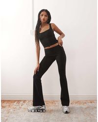 Weekday - Leggings De Campana Negros Elásticos Sin Costuras Mix & Match De - Lyst