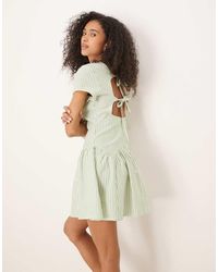 ASOS - Gestreepte Mini T-Shirtjurk Met Verlaagde Taille - Lyst