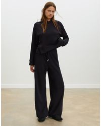 Stradivarius - Zacht Aanvoelende Flare-Joggingbroek - Lyst