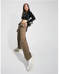 Mujer Ropa de Pantalones pantalones de vestir y chinos de Pantalones de pernera recta Trousers de Stella McCartney de color Negro 