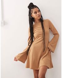 Reclaimed (vintage) - Textured Jersey Flare Sleeve Boho Mini Dress - Lyst