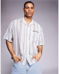 ASOS - Camisa Blanca Y Azul A Rayas Extragrande Con Bordado En El Pecho De - Lyst