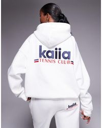 Kaiia - Sweat à capuche oversize d'ensemble en coton majoritaire à logo tennis club brodé - blanc et bleu marine - Lyst