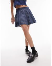 TOPSHOP - Mini-jupe plissée en jean - moyen à rayures - Lyst