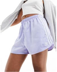 adidas Originals - Pantaloncini stile sprinter lilla con 3 strisce - Lyst