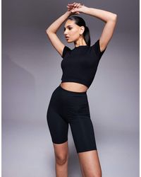 4505 - Camiseta Negra Deportiva Con Diseño Encogido De Canalé Sin Costuras Icon De - Lyst