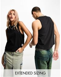 Calvin Klein - Camiseta corta negra sin mangas con costuras unisex exclusiva en asos - Lyst