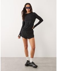 4505 - Icon Woven Run Short With Zip Pockets - Lyst