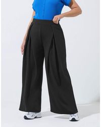 Yours Clothing - Pleated Wide Leg Trousers - Lyst