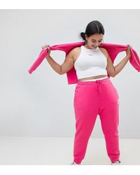 Nike Plus Rally Pink Swoosh Logo Joggers