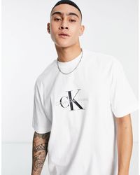Calvin Klein - Camiseta blanca extragrande con monograma del logo en el pecho - Lyst