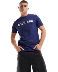 Tommy Hilfiger - T-shirt blu multicolore con stampa di monogramma - Lyst