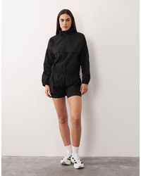 4505 - Ripstop Overhead Water Repellent Track Jacket With Chest Pocket - Lyst