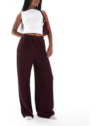 New Look - Pantalon ample texturé - bordeaux - Lyst