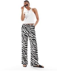 Vero Moda - – easy – hose mit weitem bein, taillenschnürung und zebramuster - Lyst