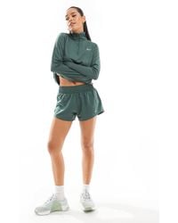 Nike - Nike - one training - short 3 pouces à taille mi-haute - Lyst