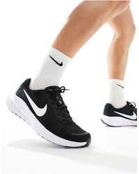 Nike - Revolution 7 - baskets - et blanc - Lyst