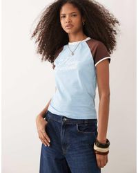 ASOS - Contrast Raglan Sleeve T-shirt With Highly Favoured Graphic - Lyst